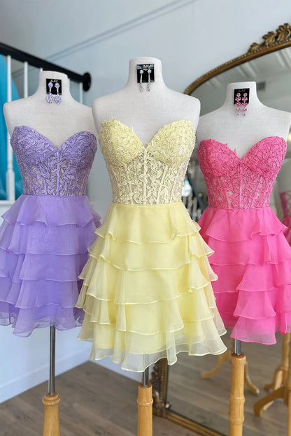 Elegant A-line sweetheart chiffon short dress on a model.