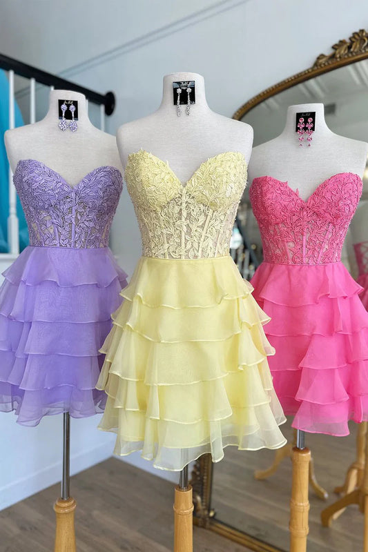 Elegant A-line sweetheart chiffon short dress on a model.