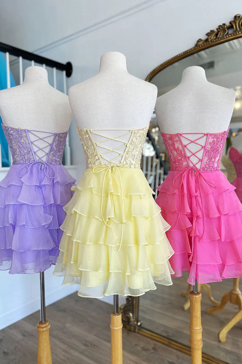Back view of the short chiffon homecoming dress with A-line silhouette.
