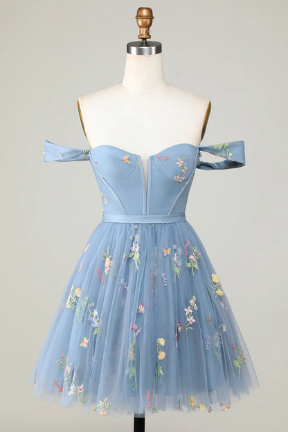 Elegant A-line homecoming dress with sweetheart neckline and embroidery.