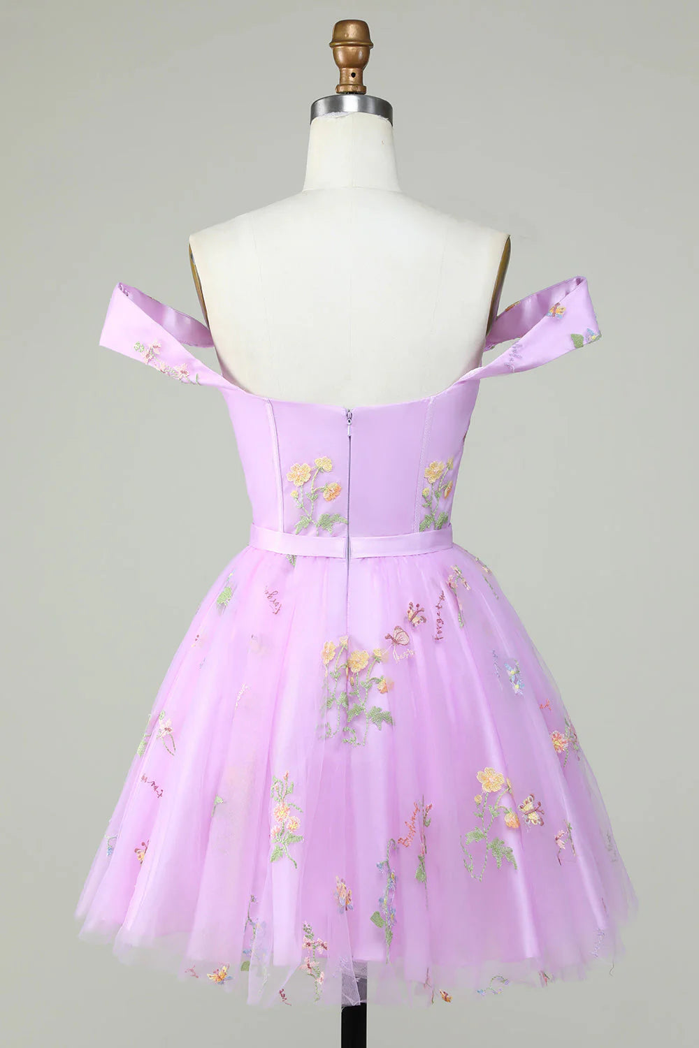 Full view of embroidered sweetheart homecoming dress.