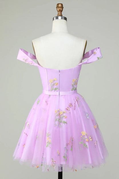 Full view of embroidered sweetheart homecoming dress.
