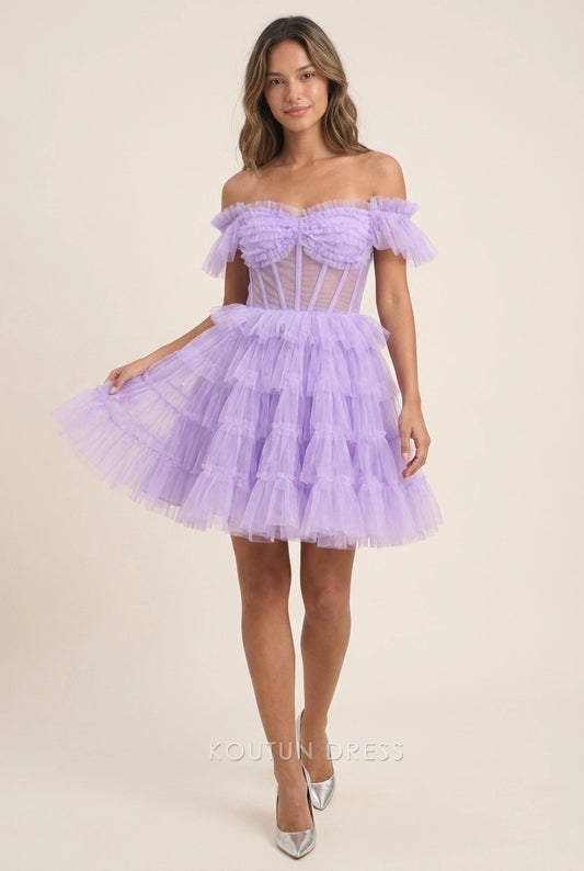 Model wearing a lavender A-line mini homecoming dress with off-shoulder ruffles and tiered tulle skirt.