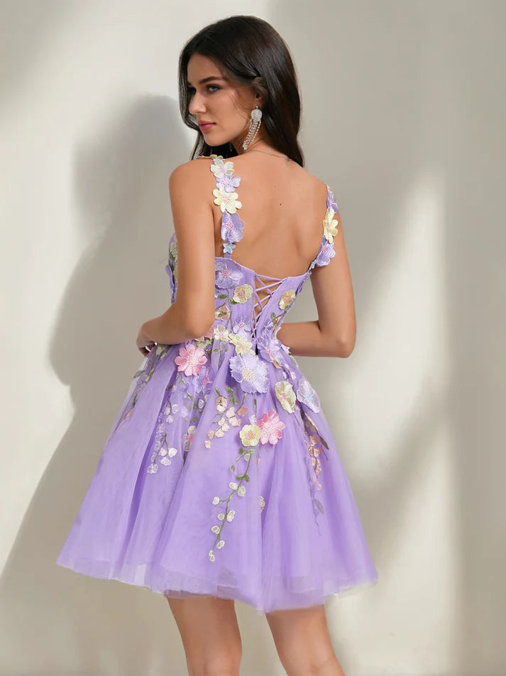Side view of the pleated A-Line tulle homecoming dress.