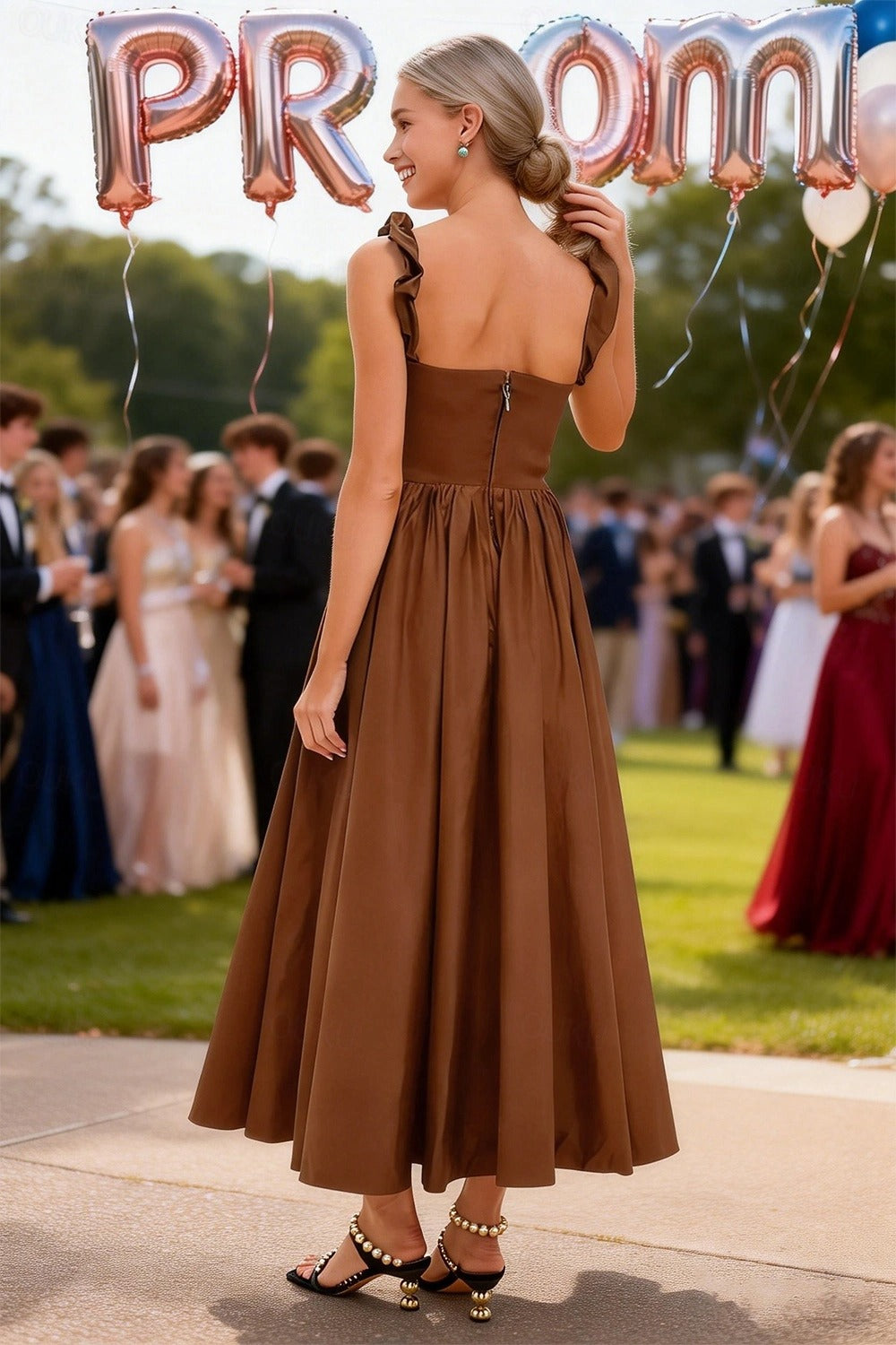Back view of the Koutun A-line midi dress, showing ruffled straps and flowy skirt.