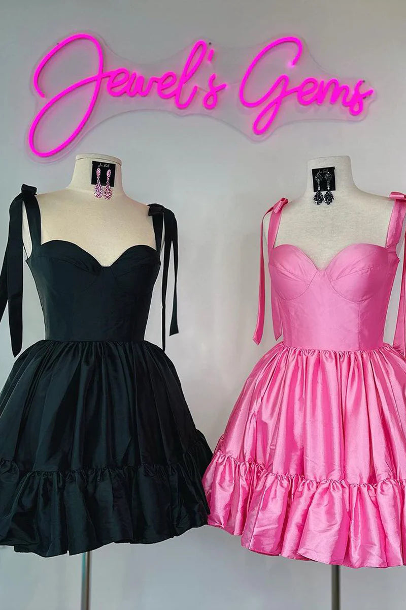 Back view of a coral satin sweetheart short homecoming dress, showcasing the smooth fabric.