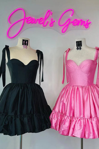 Back view of a coral satin sweetheart short homecoming dress, showcasing the smooth fabric.
