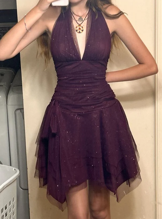 Dark purple tulle homecoming dress with sweetheart neckline.
