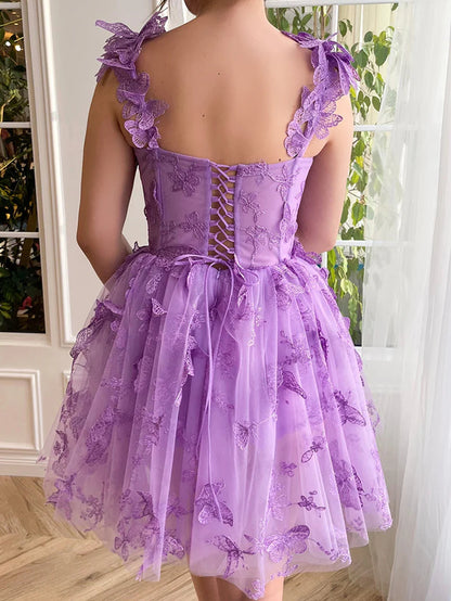 Back view of lilac A-line short tulle dress with 3D butterflies.