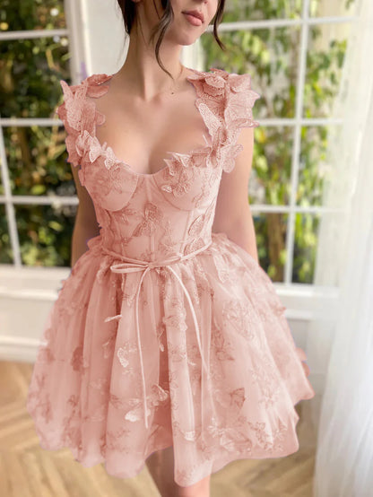 Lilac A-line short tulle prom dress with 3D butterflies, showing skirt detail.