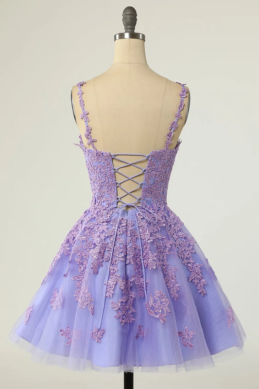 Side view of the purple A-line tulle V-neck dress, highlighting the spaghetti straps.