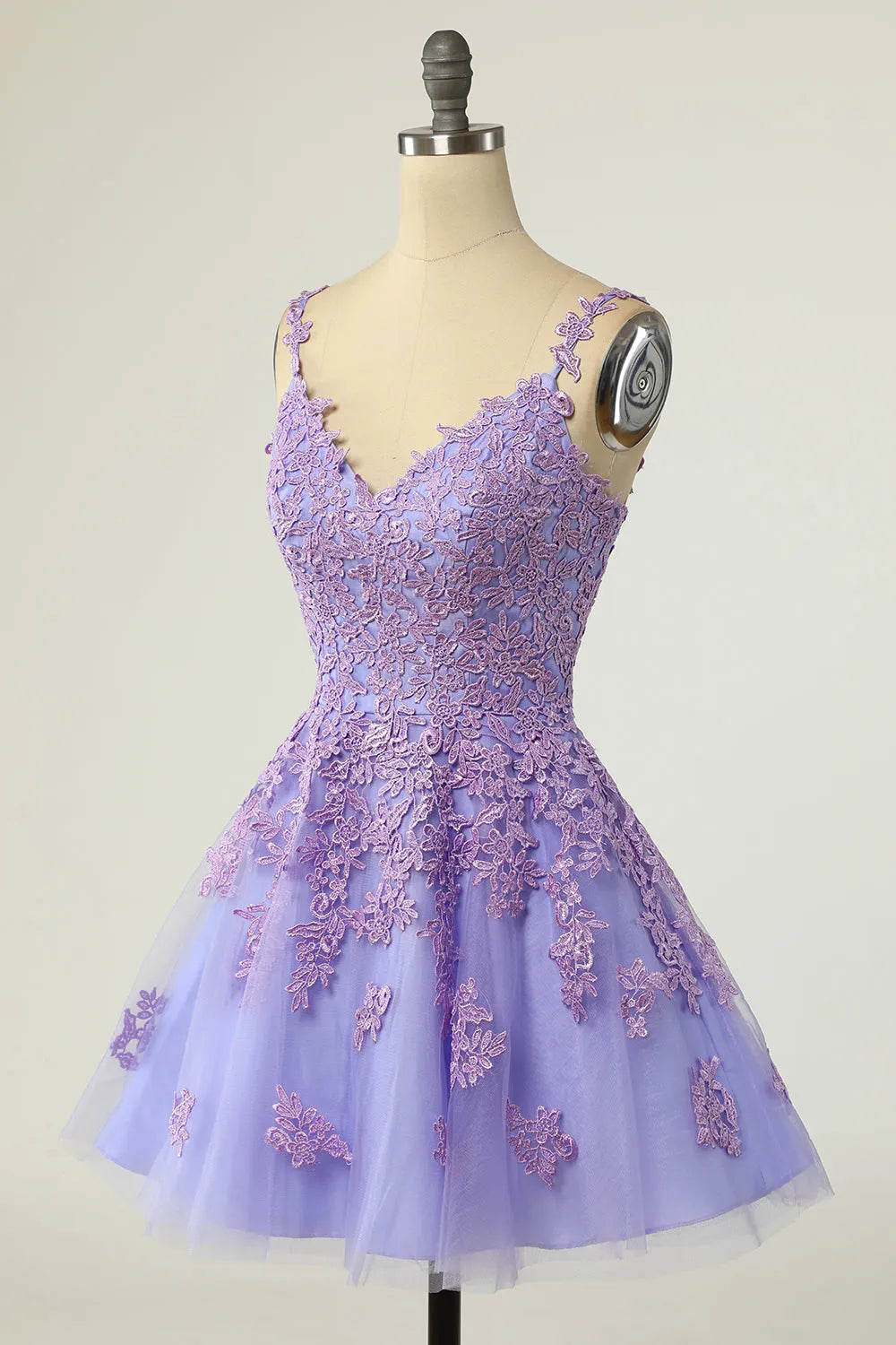 Back view of the purple short homecoming dress, showing the flowing tulle skirt.