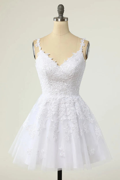 Close-up of the V-neckline and spaghetti straps on the purple tulle dress.