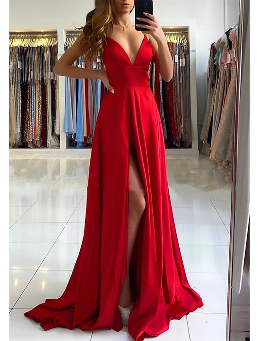 Model wearing an elegant A-line V-neck backless prom dress with pleats and a sweep train.