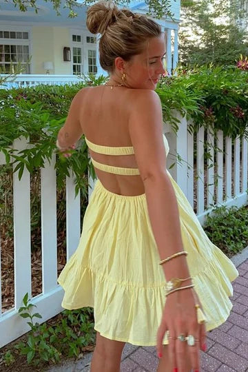 Back view of a pleated satin short homecoming dress.