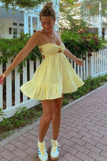 Side view of an A-line empire-waist satin short dress.