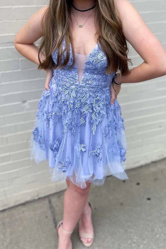 Lavender A-Line V-Neck short homecoming dress with floral appliques and lace-up back.