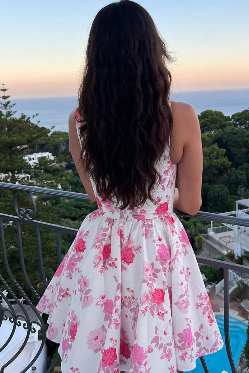 Model showcasing the pink A-line floral short homecoming dress.