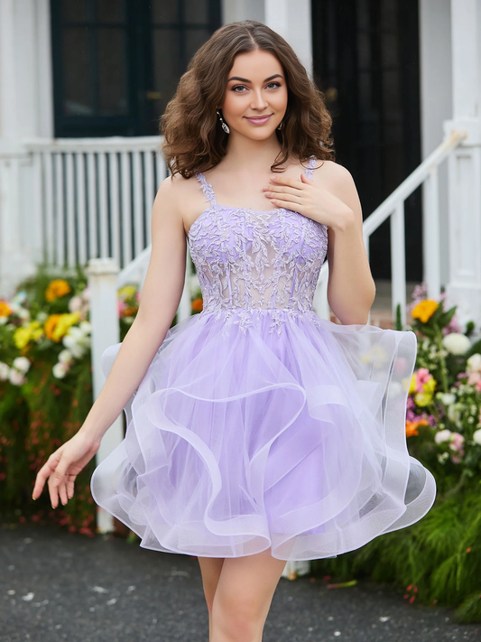 Lilac short tulle homecoming dress with appliqued corset top and deep V-neck, front view.