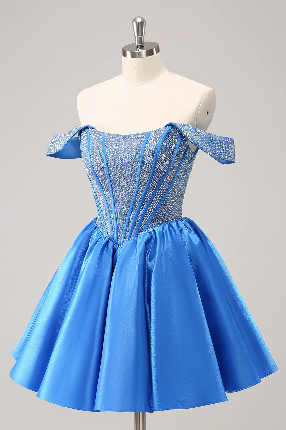 Back view of blue A-line off-shoulder dress showcasing lace-up detail.