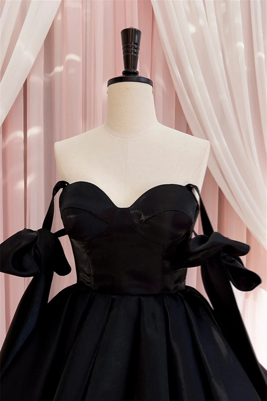 Koutun Black Pleated A-line Dress with bow tie, full length.