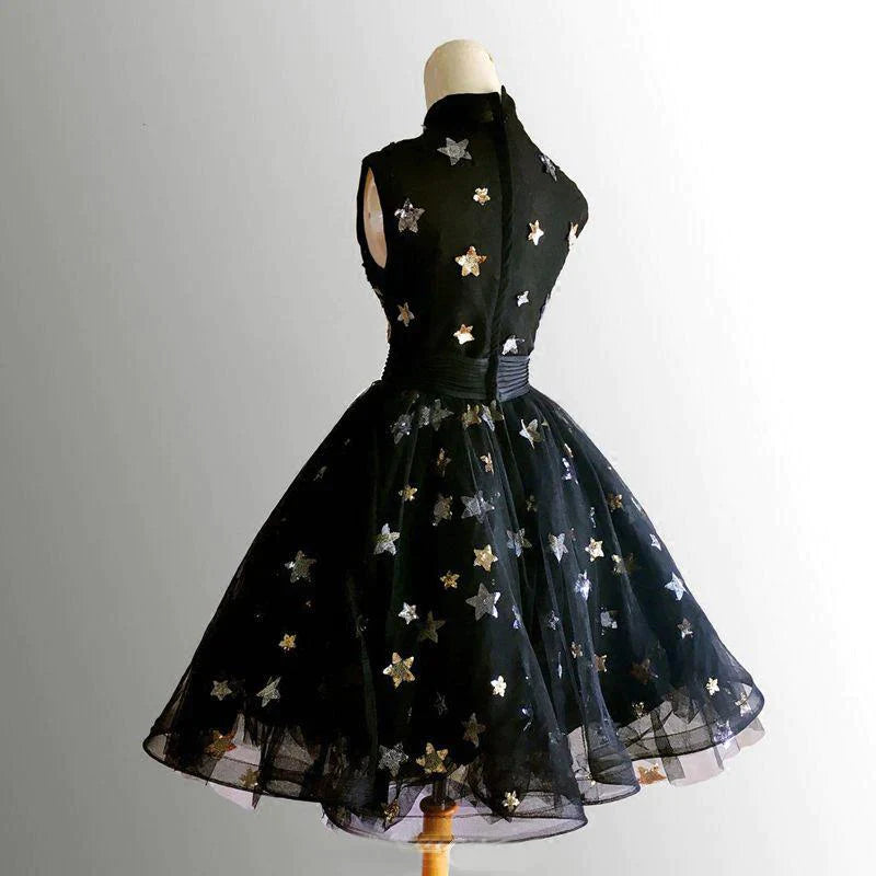 Sophisticated black short prom dress with high neckline.