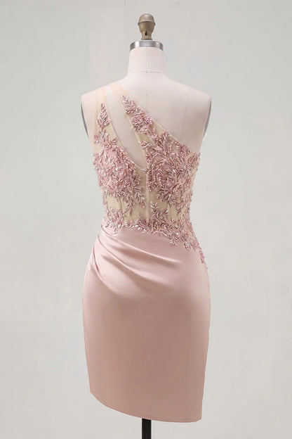 Full view of the blush pink one-shoulder homecoming dress with cutout and lace details.