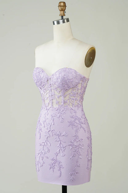Close-up of appliques and corset detail on a formal dress.