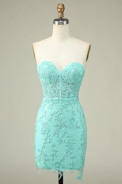 Green bodycon sweetheart corset homecoming dress with appliques.
