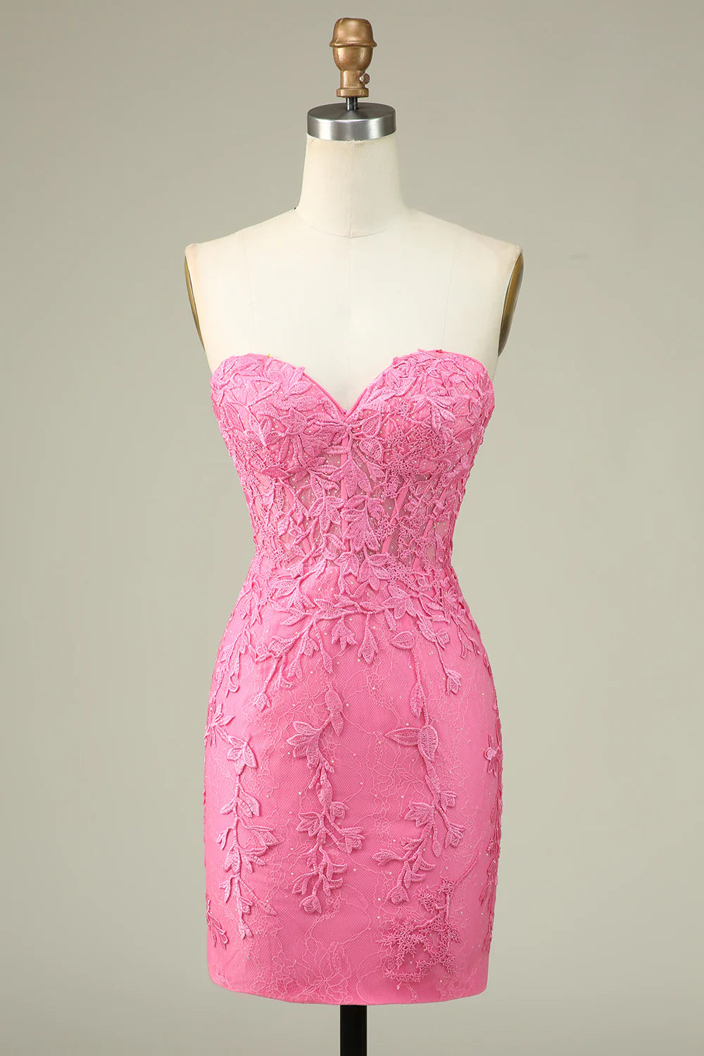 Pink bodycon sweetheart corset homecoming dress with appliques.