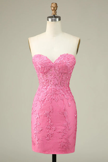 Pink bodycon sweetheart corset homecoming dress with appliques.