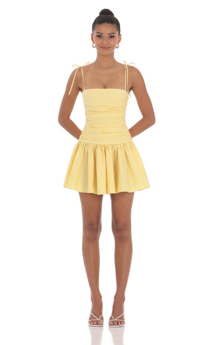 Side profile of the elegant fit and flare party dress.