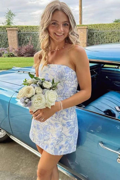 Model wearing a blue floral strapless bodycon short dress.