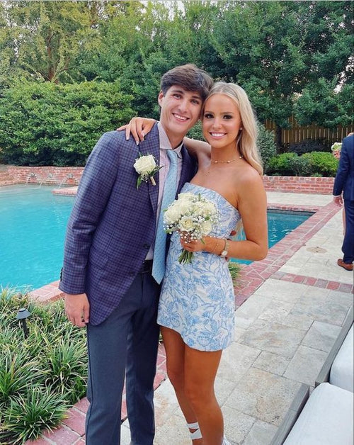 Elegant short blue dress with floral print for parties.