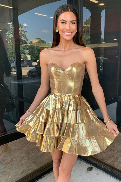 Elegant gold metallic A-line homecoming dress with sweetheart neckline and ruffles.