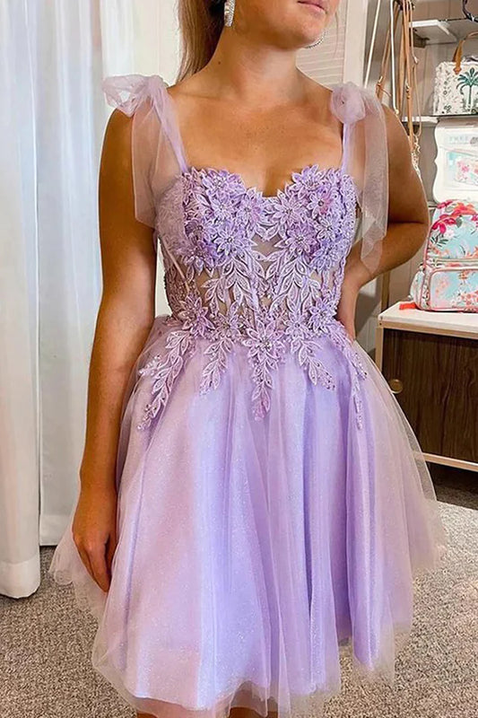 Model wearing a lilac tulle lace A-line sweetheart short homecoming dress.
