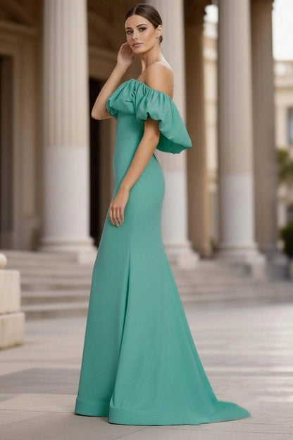 Side profile of the Koutun off-shoulder ruffled formal dress.