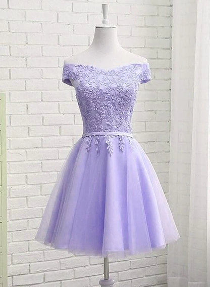 Full-length view of the off-shoulder A-line dress, highlighting its short hemline.
