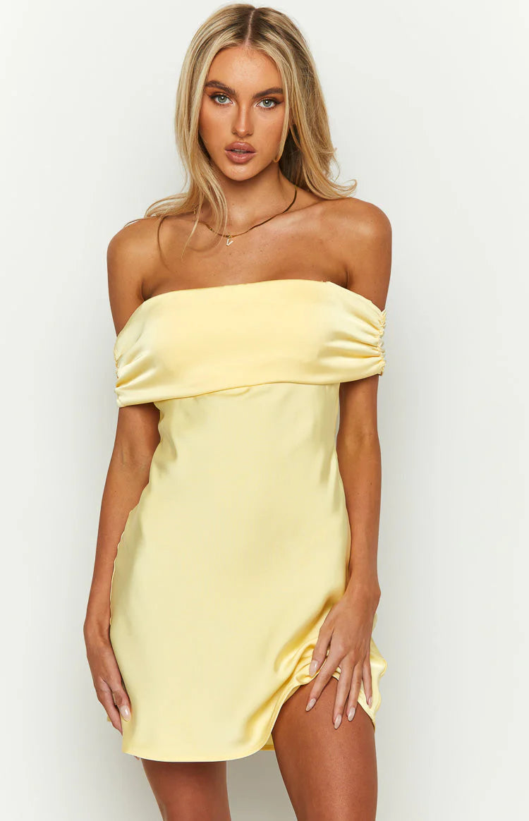 Back view of the off-shoulder bodycon dress, showcasing its fitted silhouette.