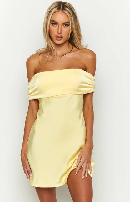 Back view of the off-shoulder bodycon dress, showcasing its fitted silhouette.