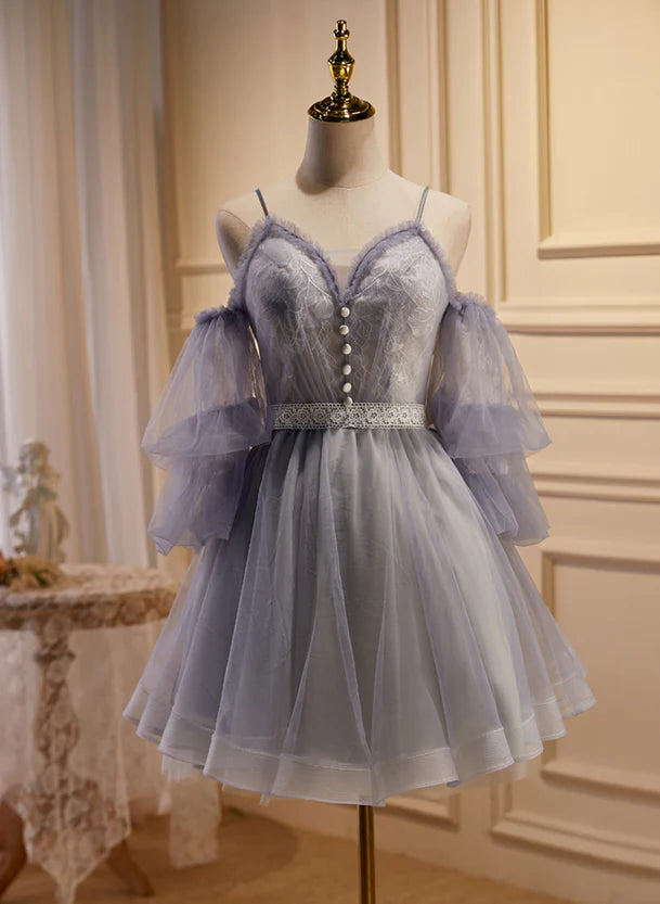 Model wearing an elegant off-shoulder short tulle and lace homecoming dress.