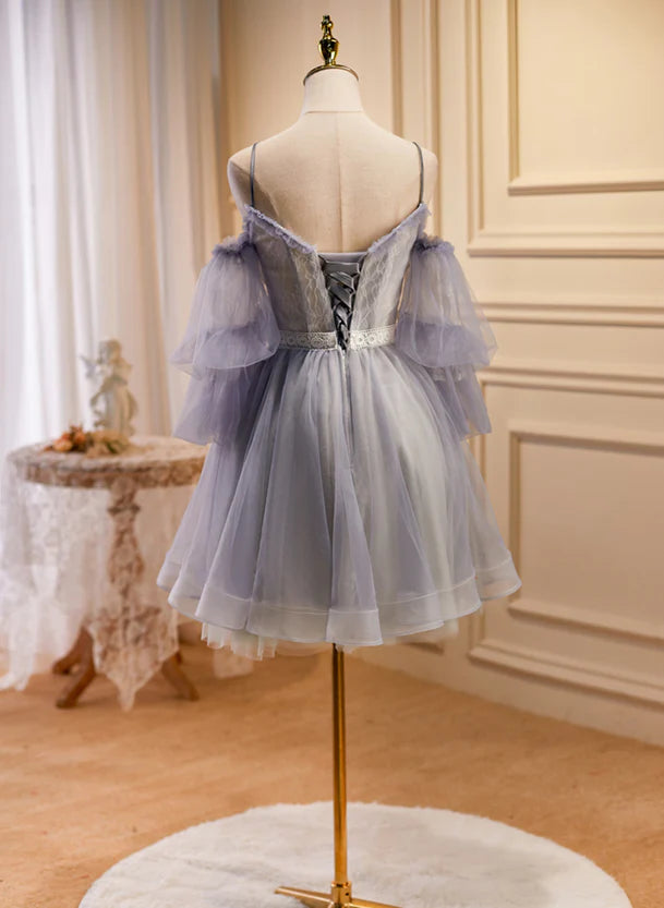 Back view of the off-shoulder short tulle party dress with lace details.