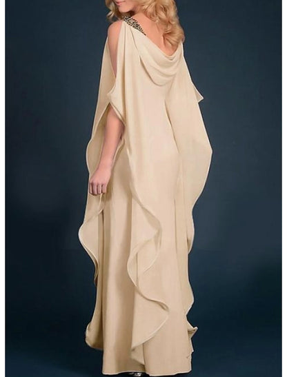 Back view of the elegant dark chiffon sheath dress with cascading ruffles.