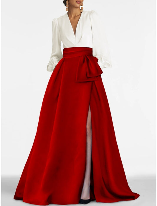 Back view of a woman in a red A-line satin formal dress.