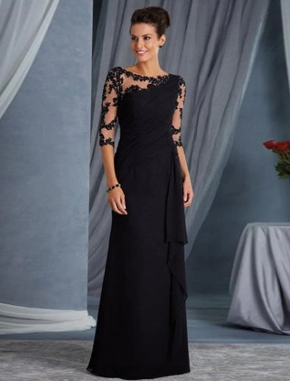 Elegant sheath evening gown with lace appliques and half sleeves.