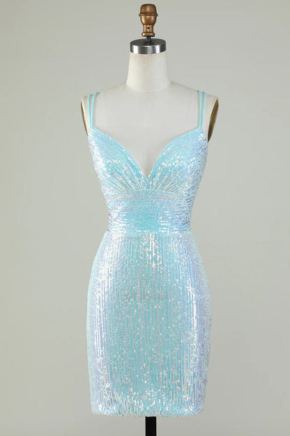 Light blue sequin sheath homecoming dress with spaghetti straps and criss-cross back.