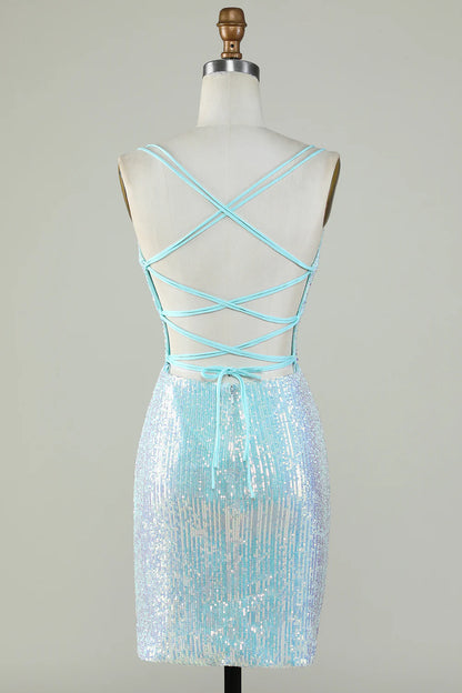 Back view of light blue sequin dress showing criss-cross straps.