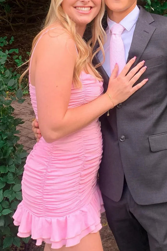Back view of a ruched short homecoming dress with ruffles.
