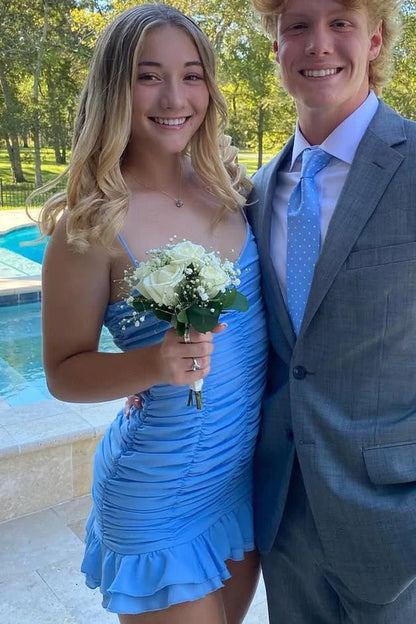 Side view of a V-neck spaghetti strap homecoming dress.