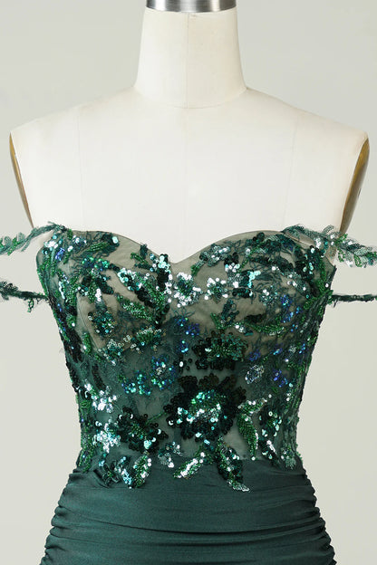 Close-up of sequin and applique details on the dress.